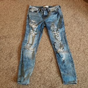 Acid low rise skinny jeans